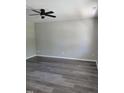 Bright bedroom with hardwood floors and neutral walls at 2121 Lime St, Durham, NC 27704
