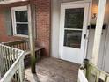Welcoming porch with a wooden bench and view of the entrance at 317 Gary St, Durham, NC 27703