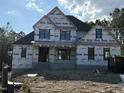 Unfinished construction with a focus on energy efficient windows and insulation to lower home energy costs at 34 Cloudview Ct, Pittsboro, NC 27312