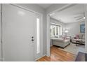 Light-filled living room showcasing wood floors, and comfortable seating at 7918 Yester Ct, Raleigh, NC 27615