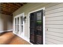 Covered patio with outdoor access and a view of the property at 1000 Brighthurst Dr # 104, Raleigh, NC 27605