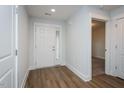 Bright entryway with hardwood floors, leading to other rooms in the home at 905 Alice Ct, Haw River, NC 27258