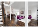 Spacious living area with hardwood floors, stylish furnishings, and plenty of natural light at 2003 Pilot Mountain Ct, Apex, NC 27502