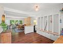 Spacious entryway featuring hardwood floors, custom built-in storage, and natural light at 202 Oak Tree Dr, Chapel Hill, NC 27517