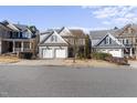 Charming home with a two-car garage and well-maintained front yard at 2721 Cameron Pond Dr, Cary, NC 27519