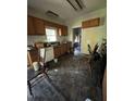 View of the kitchen featuring cabinets, appliances, and natural light at 1036 Altice Dr, Raleigh, NC 27603