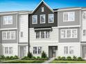 New townhouse construction with black and white facade, complimented with professional landscaping at 1038 Zelkova Ln, Chapel Hill, NC 27517
