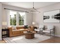 Cozy living room with large window, modern light fixture and stylish decor at 1038 Zelkova Ln, Chapel Hill, NC 27517