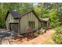 Well-maintained home featuring a brick walkway, an attached garage, and tasteful landscaping at 237 Jason Way, Youngsville, NC 27596