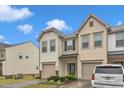 Inviting townhome with attached garage and well-maintained landscaping at 303 Leighann Ridge Ln, Rolesville, NC 27571