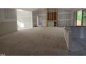 Open-concept living room featuring fireplace with natural light and neutral walls at 4248 Jacks Creek Trl, Burlington, NC 27215