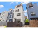 Modern three-story home with fenced yard, and potential roof top terrace providing privacy at 610 Velma Hopkins Ln, Raleigh, NC 27603