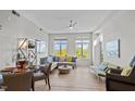 Spacious living area with ample seating, large windows with city views, and contemporary design elements at 618 N Boylan Ave # 810, Raleigh, NC 27603