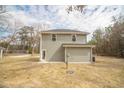 Exterior shot of new construction home with a spacious, level backyard at 112 Ambergate Ct, Rocky Mount, NC 27804