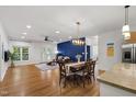 Bright and open living space with hardwood floors and a stylish dining area at 3359 Denise St, Durham, NC 27704