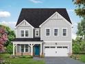 Charming two-story home with gray siding, a covered porch, an attached two-car garage, and landscaped yard at 448 Golden Dragonfly St, Wake Forest, NC 27587