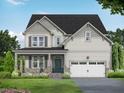 Attractive two-story home showcasing a stone-accented porch and a two-car garage at 456 Golden Dragonfly St, Wake Forest, NC 27587