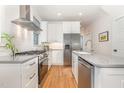 Well-equipped kitchen featuring modern stainless steel appliances and a sleek design at 902 B Oakland Ave, Durham, NC 27705