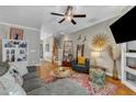 Cozy living room features hardwood floors, stylish decor, and a staircase leading to the upper level at 137 Lanigan Pl, Cary, NC 27513