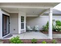 Cozy patio with comfortable seating, perfect for relaxing outdoors at 1520 Palmer Hill Dr, Durham, NC 27703