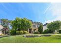 Beautiful home with manicured lawn, mature trees, and inviting front porch at 528 Bankhead Dr, Cary, NC 27519