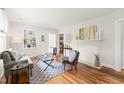 Bright living room featuring hardwood floors, fireplace and neutral paint at 109 Davidson Ave, Durham, NC 27704
