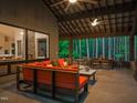 Secluded patio with comfortable seating overlooking lush greenery at 2721 Silver Stirrup Ln, Apex, NC 27502