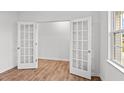 Spacious office area with French doors and hardwood floors at 7370 Michelle Rd, Rocky Mount, NC 27803