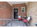 Inviting porch with seating and decor at 231 Grindstone Dr, Apex, NC 27502