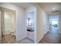 Inviting hallway leading to bathroom, bedroom, and main living area at 7461 Michelle Rd, Rocky Mount, NC 27803