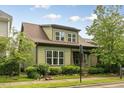 This cozy home has a well-manicured lawn and lush landscaping at 1930 Briar Chapel Pkwy, Chapel Hill, NC 27516