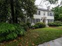 Beautiful traditional home with green shutters and manicured landscaping at 1930 Reid St, Raleigh, NC 27608