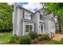 Beautiful exterior view of a well-maintained home with manicured landscaping and natural light at 2441 Deanwood Dr, Raleigh, NC 27615