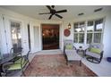 Relaxing patio area with French doors opening to indoor living spaces at 2901 Market Bridge Ln # 203, Raleigh, NC 27608