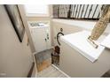 Foyer view from above, showing the front door, coat rack, and stylish decor at 2921 Imperial Oaks Dr, Raleigh, NC 27614