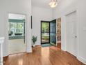 Foyer showcasing a view of the study with custom window seats and beautiful natural light at 3 Yancey, Pittsboro, NC 27312