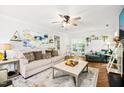 Comfortable living room with stylish decor, hardwood floors, and ample seating at 3401 Sitzman Ct, Raleigh, NC 27616
