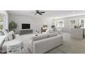 Staged living room with lots of natural light, neutral colors and hardwood floors at 4307 Pope Rd, Durham, NC 27707