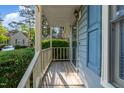 Cozy porch, perfect for relaxing outdoors, with lovely garden views at 6513 Hearthstone Dr, Raleigh, NC 27615