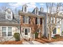 Charming brick townhome with a well-manicured front yard and inviting entrance at 2835 Bedfordshire Ct, Raleigh, NC 27604