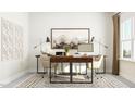 Contemporary home office with dual workstations, sleek decor, and lots of space at 308 Canyon Spring Trl, Wake Forest, NC 27587