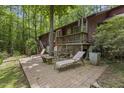 Inviting backyard patio area perfect for outdoor relaxation and entertaining at 5604 Hideaway Dr, Chapel Hill, NC 27516