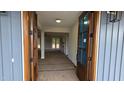 View through the front door opening into a spacious interior with abundant natural light at 60 Stream View Way, Spring Hope, NC 27882