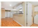 Bright living room area leading to an open kitchen, complete with laundry area at 1002 Kingswood Dr # A, Chapel Hill, NC 27517