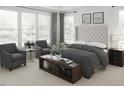 Serene main bedroom with large windows, neutral tones, and comfortable seating area at 2010 Kapalua Way # 192, Durham, NC 27703