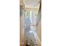 Entryway with wood floors, a stylish rug, staircase, and decoratively appointed table, creating a warm welcome at 130 Beechwood Dr, Carrboro, NC 27510