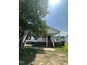 Charming single-Gathering home featuring a classic front porch and a spacious yard at 333 Park Ave, Rocky Mount, NC 27801