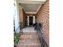 Inviting front porch with decorative columns, seating, and a 'Welcome' sign for a warm entrance at 3713 Coach Lantern Ave Ave, Wake Forest, NC 27587