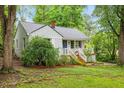 Quaint one-story home with new front stairs and a covered porch at 2324 Stevens Rd, Raleigh, NC 27610