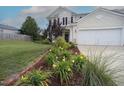 Inviting home with well-maintained lawn and landscaping at 412 Ashdale Dr, Fuquay Varina, NC 27526